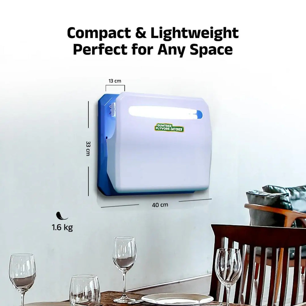 Wall-mounted fly trap with dimensions and weight displayed, set against a dining room background.