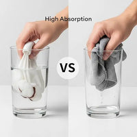 Comparison of a cotton ball and a towel absorbing water in a glass.