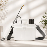 White sprayer with black nozzle and strap on a light background