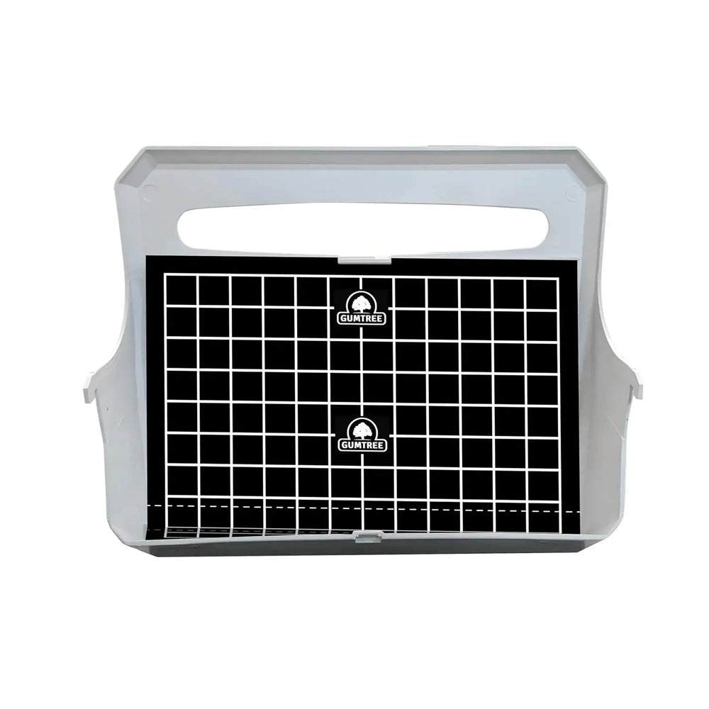 Black grid board with white handle on a white background